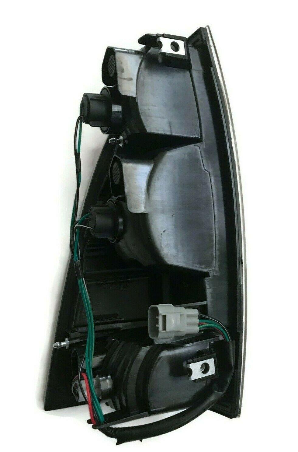 2005-2015 Toyota Tacoma Tail Lamp Passenger Side Led Type With Clear Center Lens , TO2801177. Exact fit for vehicle restoration.