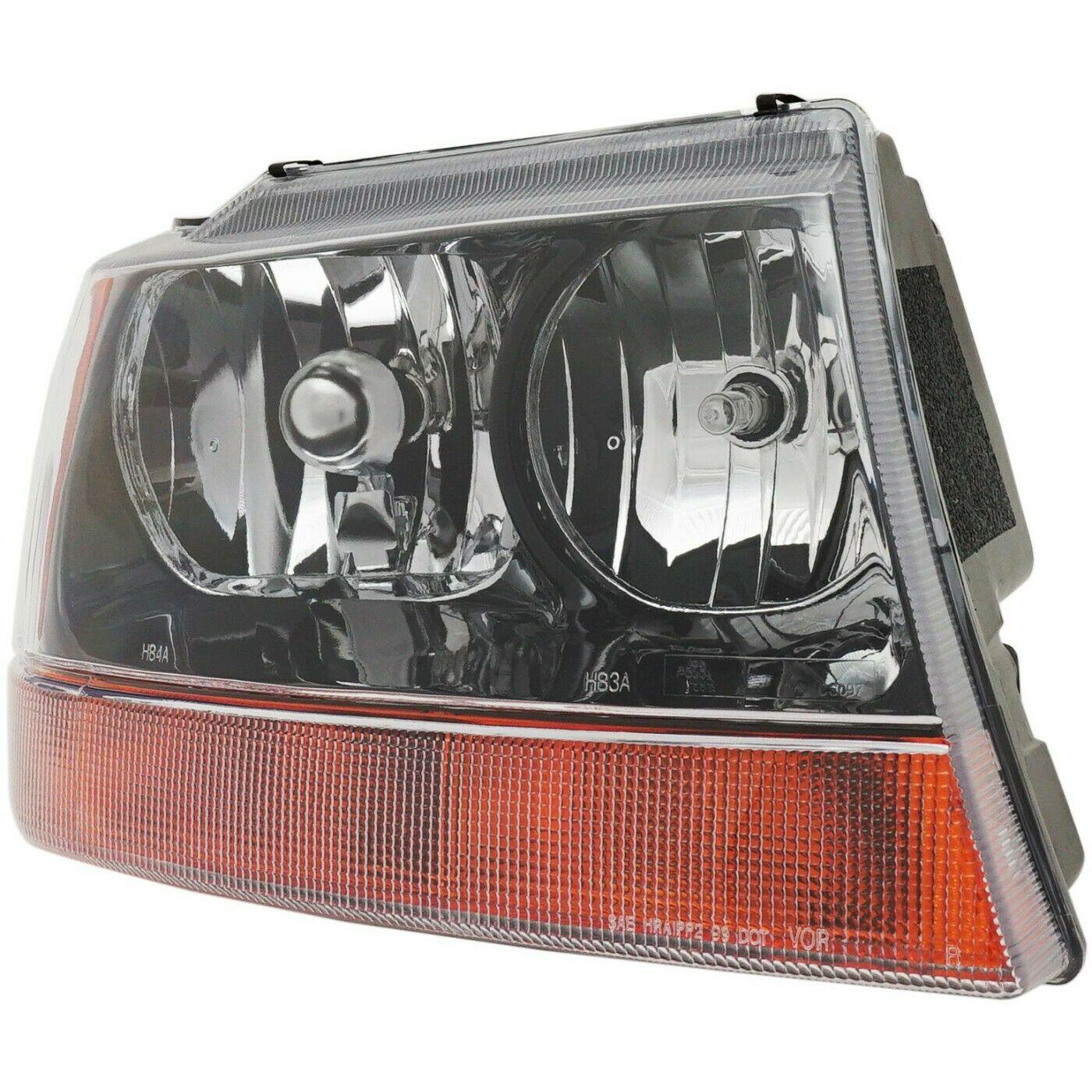 1999-2002 Jeep Grand Cherokee Head Lamp Passenger Side Yellow , CH2503121. Factory-style replacement part.