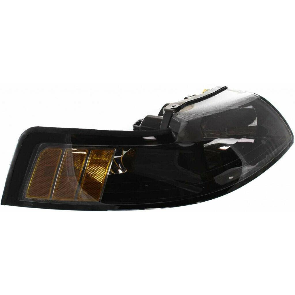 2001-2004 Ford Mustang Cobra Head Lamp Passenger Side Black Bezel , FO2503177. Durable and impact-resistant.