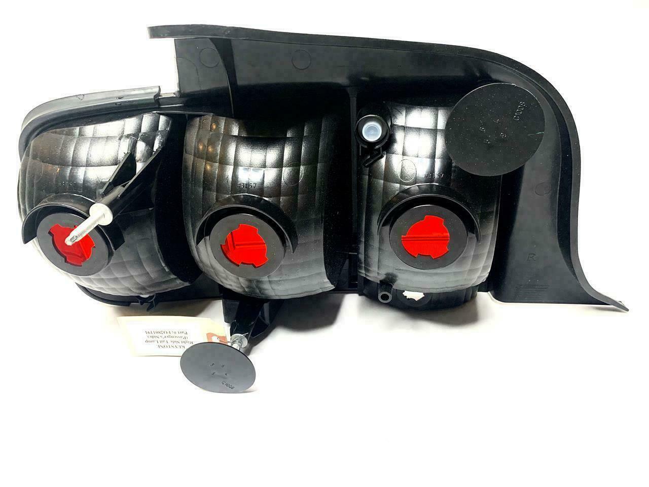 2007-2009 Ford Mustang Shelby GT500 Tail Lamp Passenger Side , FO2801191. Side view of the replacement part.