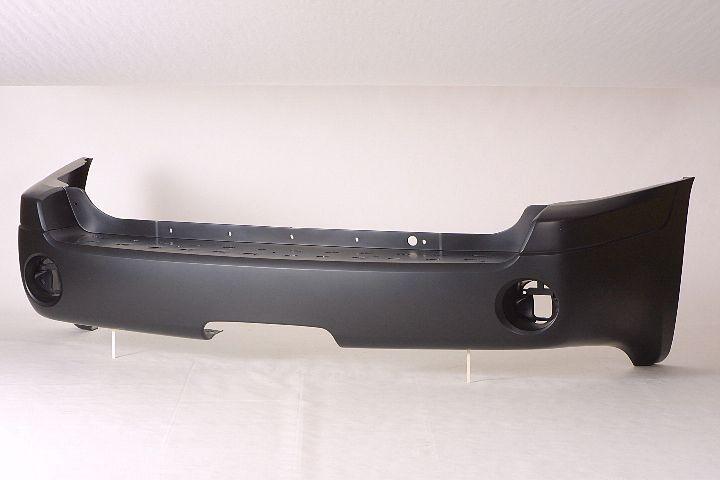 2002-2009 Gmc Envoy Rear Bumper Primed , GM1100628. Precision fitment for collision repair.