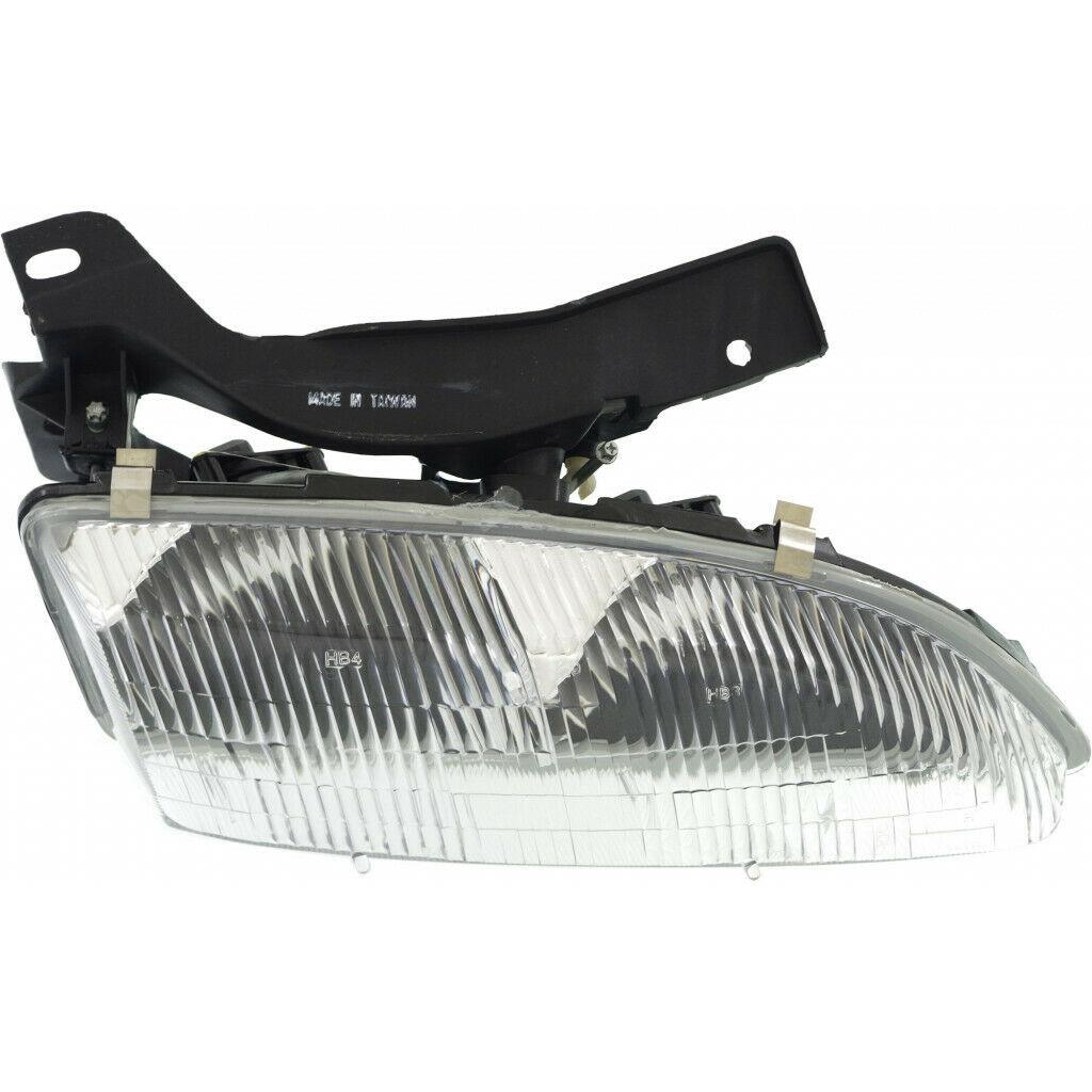 1995-1999 Chevrolet Cavalier Head Lamp Passenger Side , GM2503130. Exact fit for vehicle restoration.