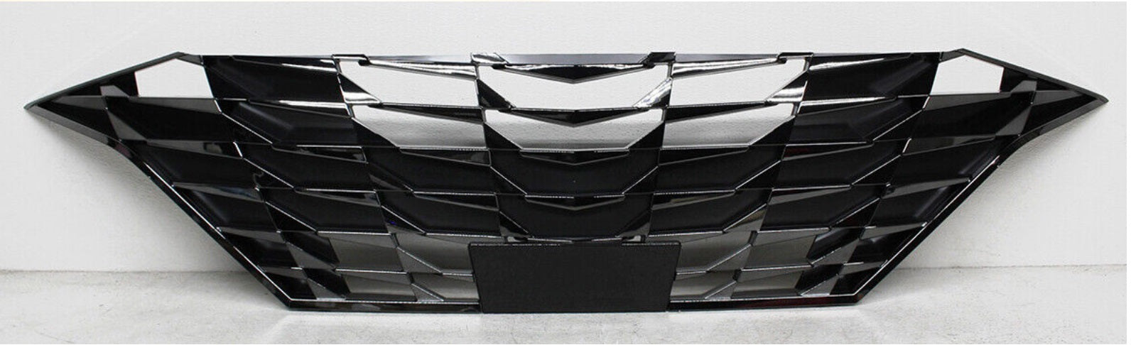 2021-2023 Hyundai Elantra Sedan Grille Front , HY1200237. Side view of the replacement part.