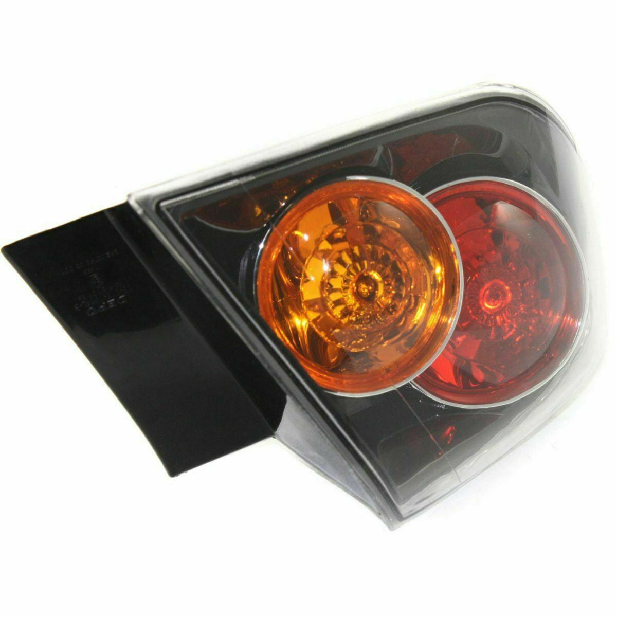 2007-2009 Mazda 3 Tail Lamp Driver Side Hb Std , MA2804106. Direct fit for easy installation.