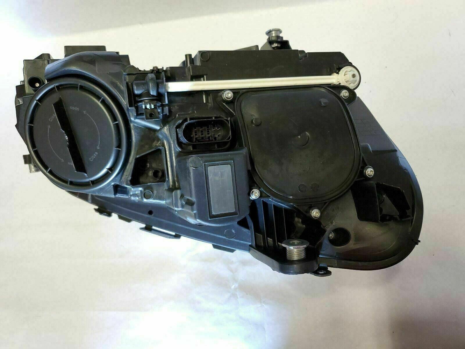 2014-2016 Mercedes E400 Head Lamp Passenger Side , MB2503219. Angle view for visual reference.