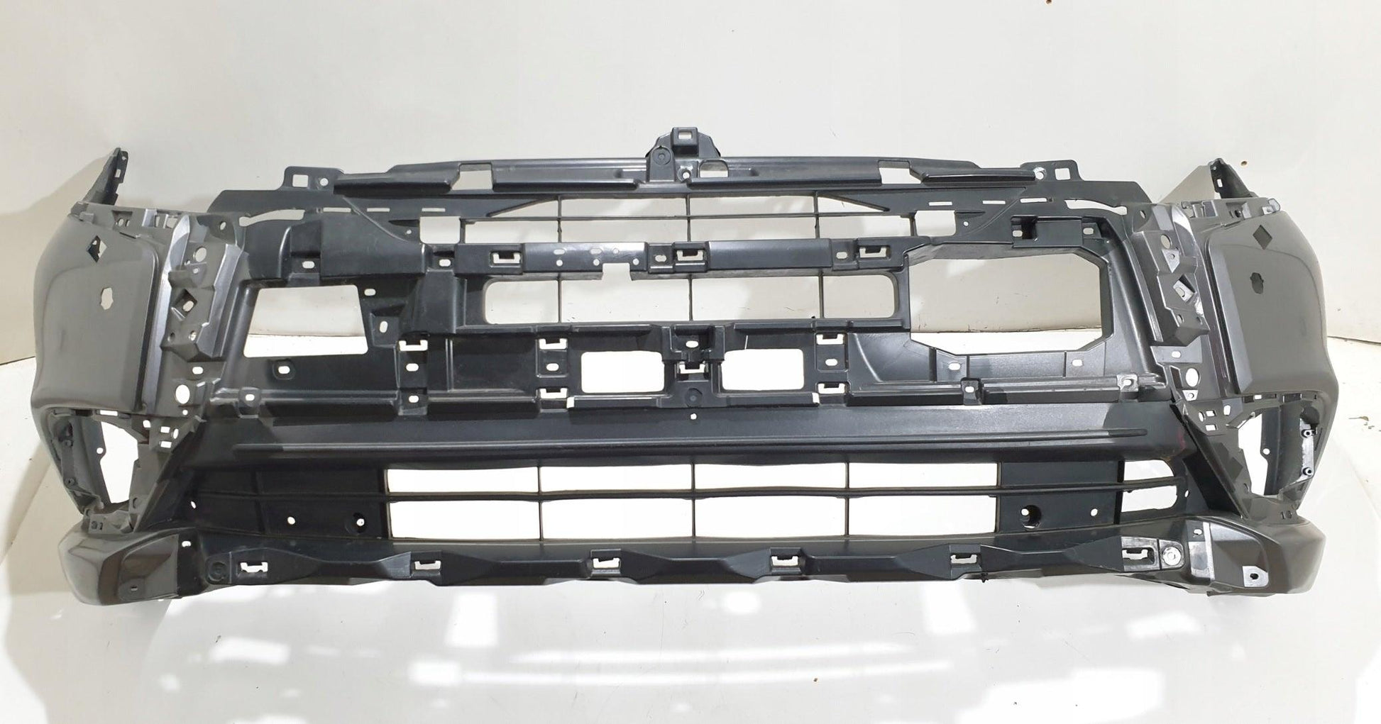 2019-2020 Mitsubishi Outlander Front Bumper Primed With Textured Lower , MI1000349. Factory-style replacement part.