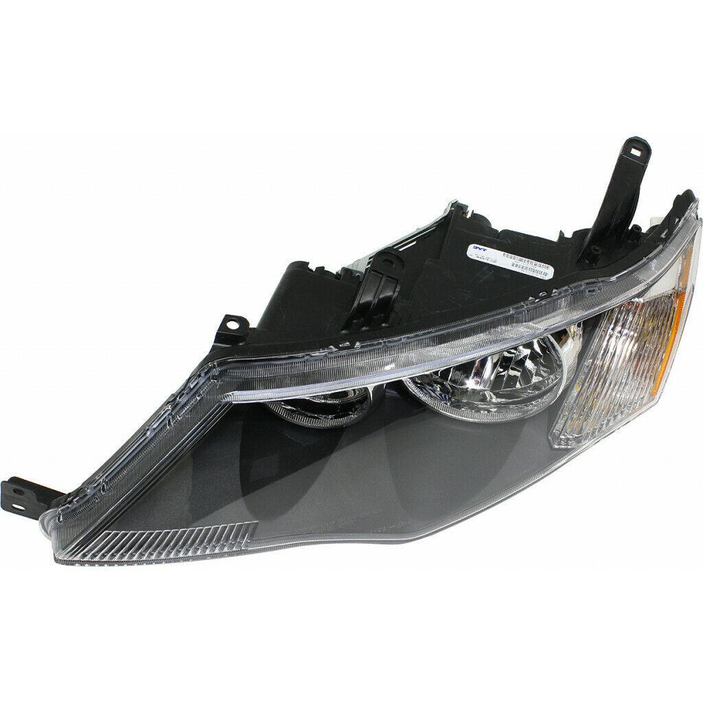 2009 Mitsubishi Outlander Head Lamp Driver Side Halogen , MI2502162. OEM-quality exterior component.
