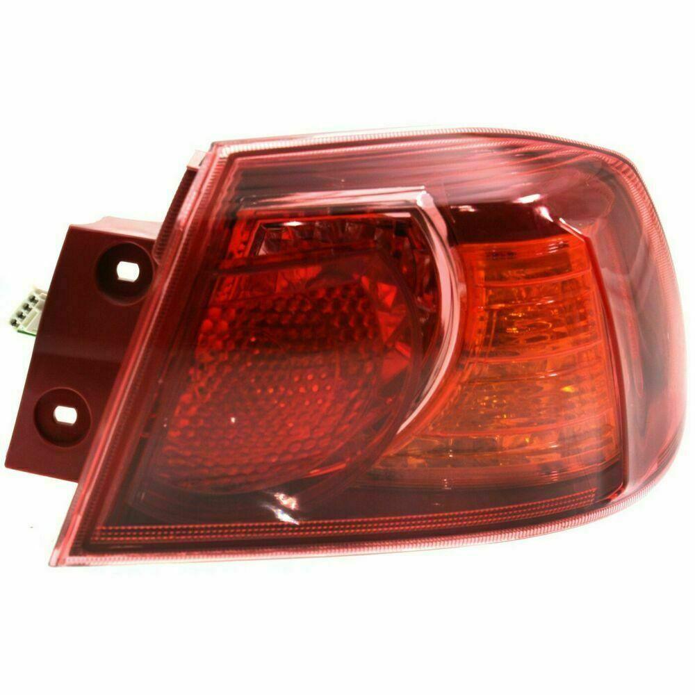 2008 Mitsubishi Lancer Evolution Tail Lamp Passenger Side Red Bezel , MI2805100. Professional-grade auto body part.