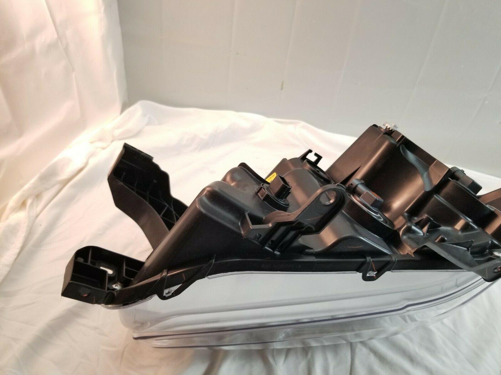 2019-2023 Toyota Tacoma Head Lamp Driver Side , TO2502284. Side view of the replacement part.