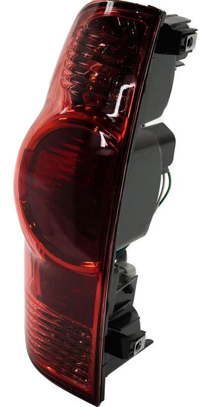 2005-2015 Toyota Tacoma Tail Lamp Driver Side With Red Center Lens , TO2800158. Factory-style replacement part.