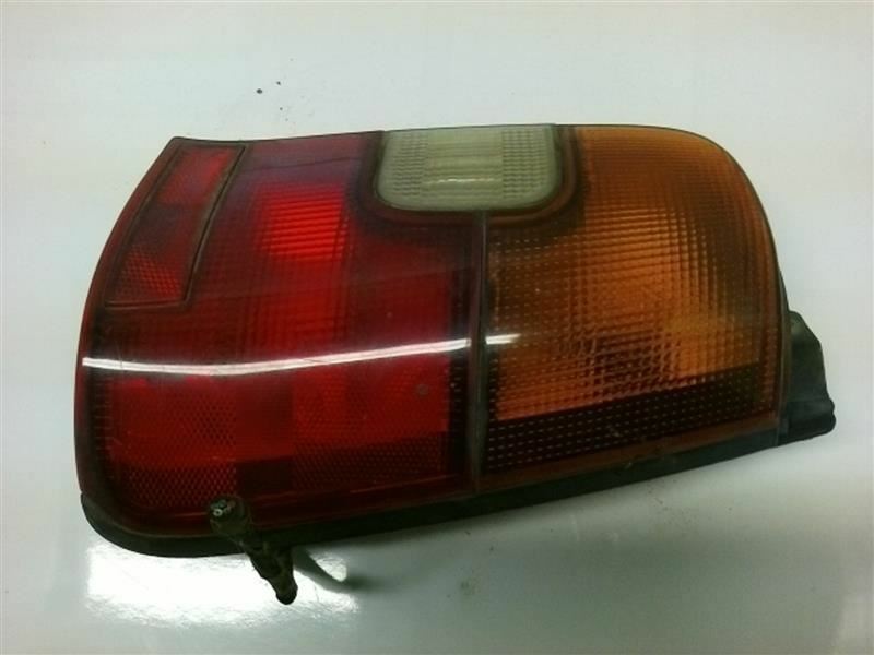 1993-1996 Toyota Corolla Wagon Tail Lamp Passenger Side , TO2801141. Exact fit for vehicle restoration.
